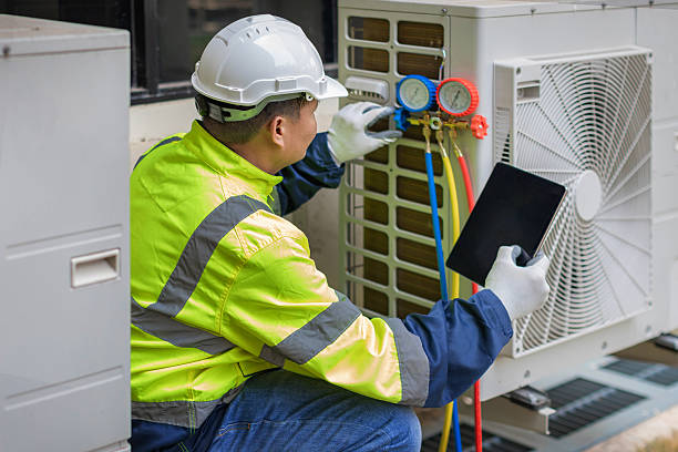 Professional Hvac technician working in Amherst, OH